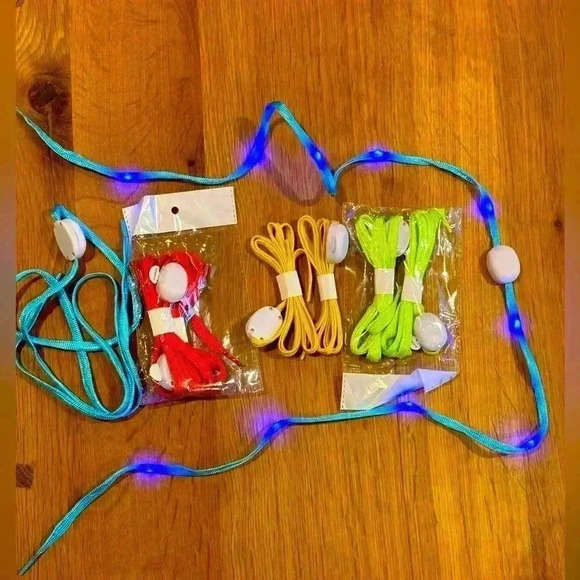Shoe laces - 4 sets of light up shoe laces green, yellow, red, and blue. - Picture 1 of 3